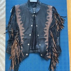 Leather vintage vest. 
Size M but can also look good in size Small too.